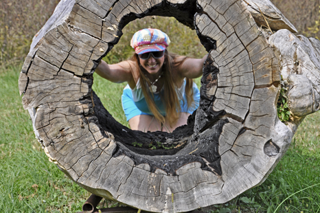 Karen Duquette peering into  the Relic #3 artwork