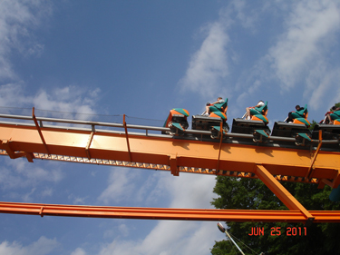 Karen Duquette and grandson on Goliath roller coaster at Six Flags GA