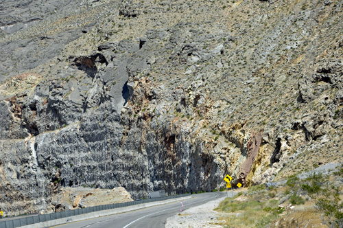 Big mountain cliffs on both sides of the RV of the two RV Gypsies