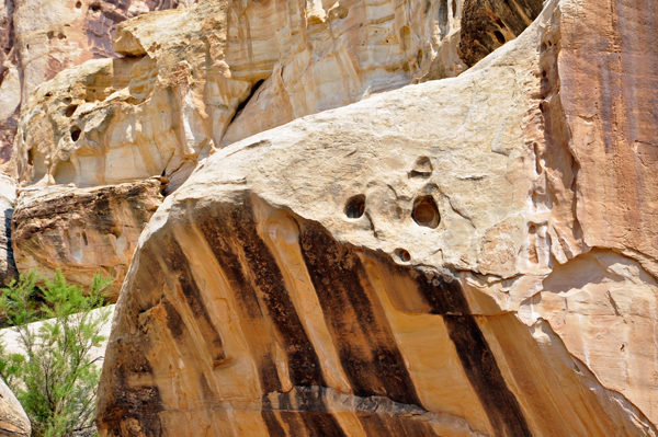 big boulders with holse and markings