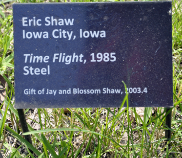 sign about the art sculpture Time Flight