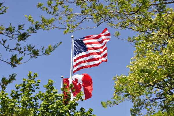 the USA and Canadian flags on the Canadian side of the Bluewater Bridge