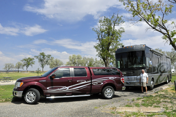 Lee Duquette and his RV and toad