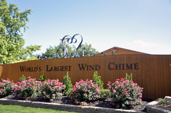 fence that says The World's Largest Wind Chime