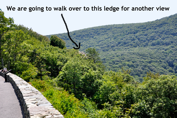 The two RV Gypsies walk to a ledge for another view