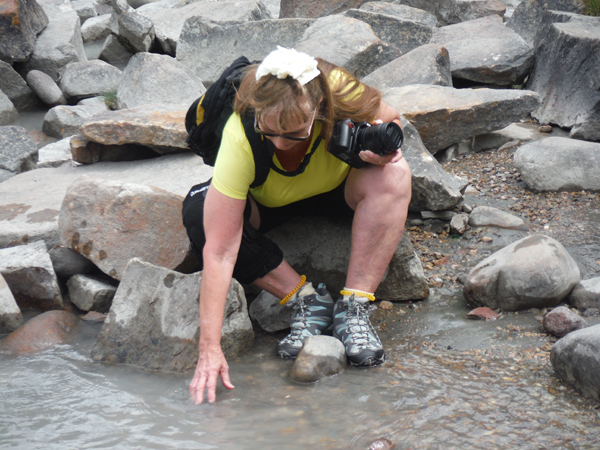 Karen touches the Athabasca River