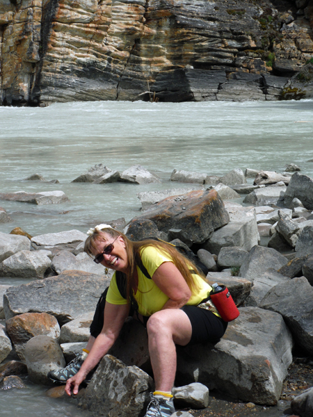 Karen touches the Athabasca River