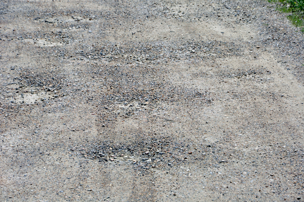 pot holes on the entry road to the campground