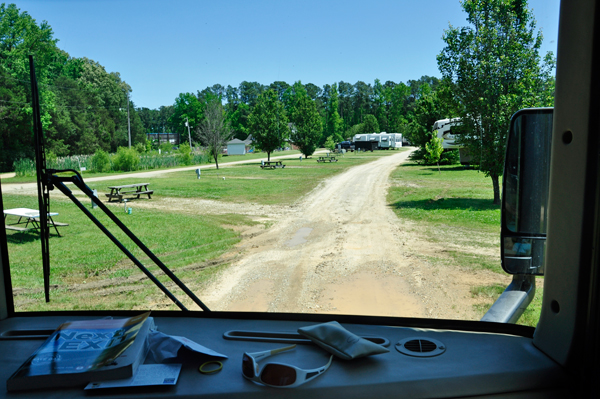 big mud puddles in the dirt road