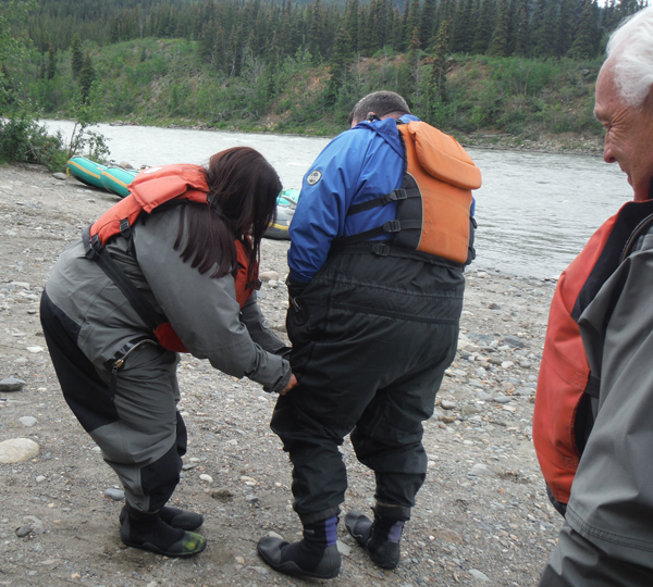 Renee adjusting John