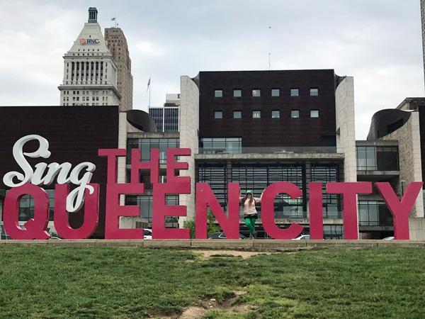 Queen City big red sign and Karen Duquette