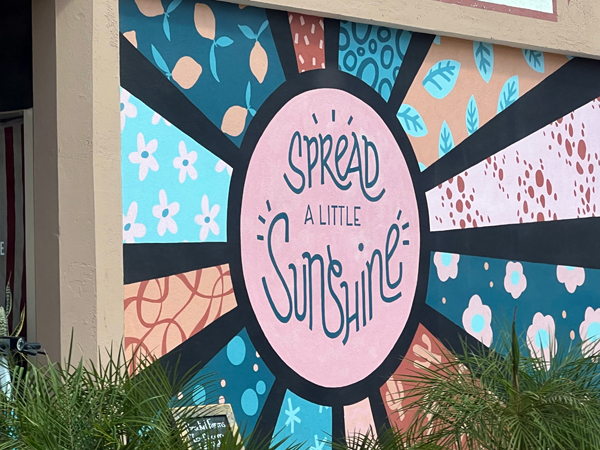 Spread a little sunshine sign