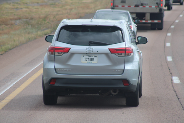 car cutting in front of the big RV