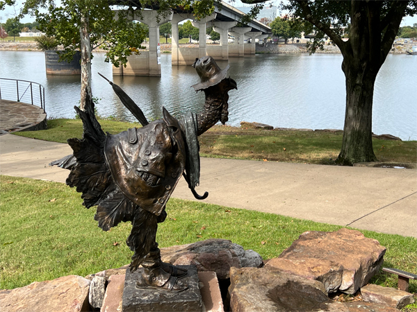 a big bird in a hat statue