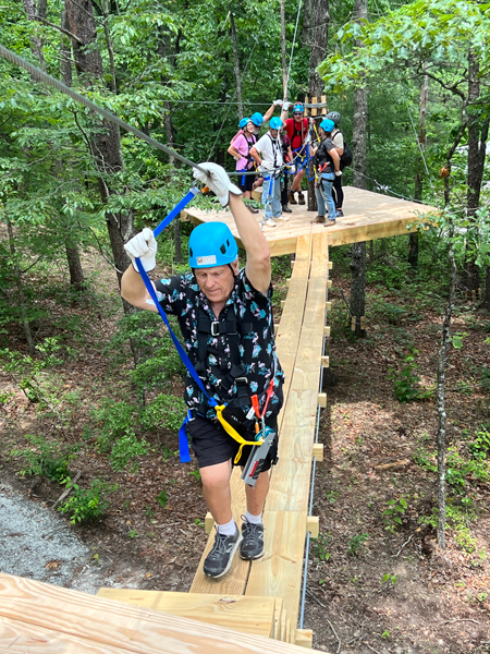 Lee Duquette on the wooden bridge