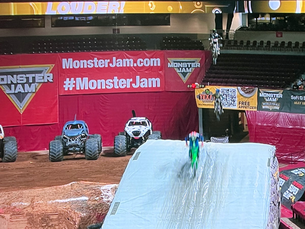 3 of the 4 bikers in the air