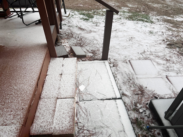 snow on the back porch steps
