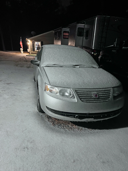 ice on the ground and car
