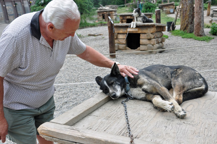 Lee petting a dog