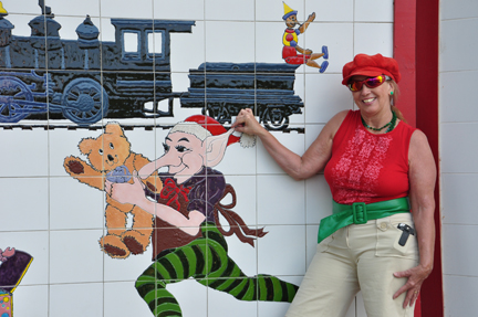 Karen Duquette and the painted building