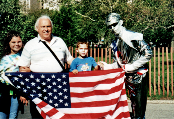 Lee Duquette and his grandchildren at the Living Statue